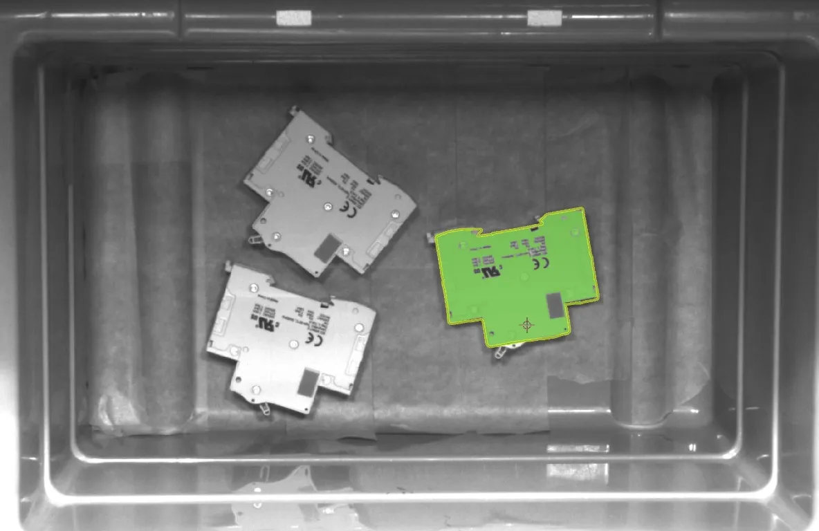 Three circuit breakers detected and outlined in the bin during the VisionPick localization sequence.